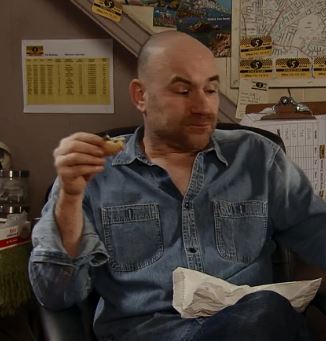  Tim's clean-shaved chest shows through his open-top shirt