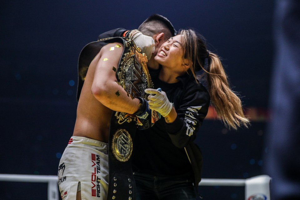  Lee celebrated the win with his older sister Angela, who has also held a ONE Championship world title