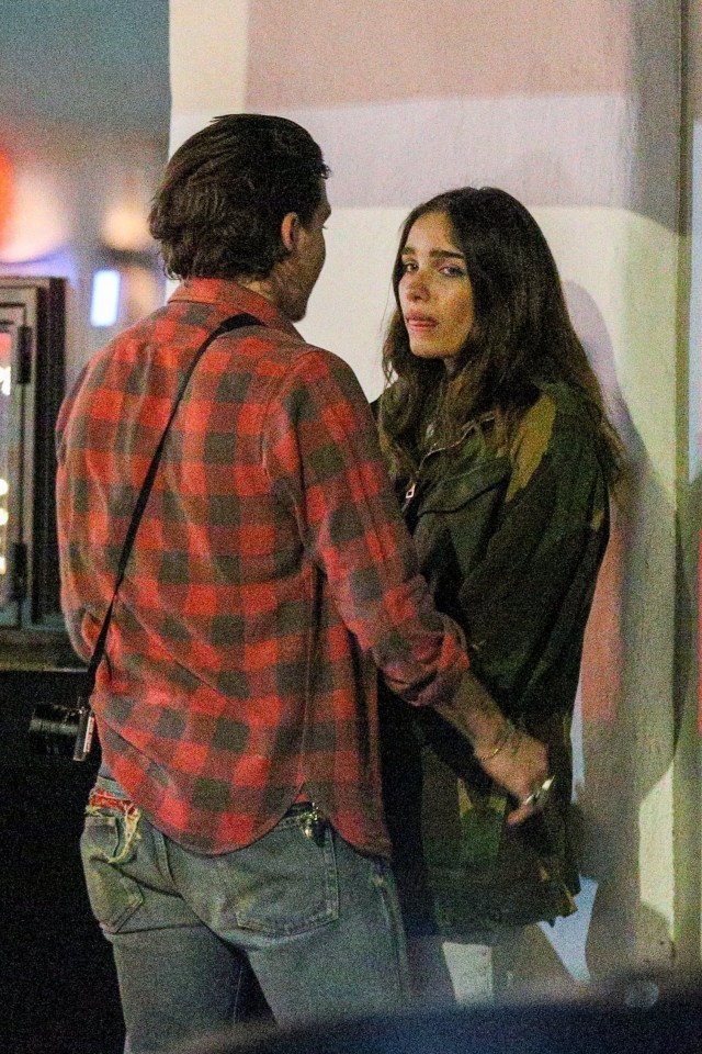 Hana was seen to be fighting back tears as the spoke outside a restaurant