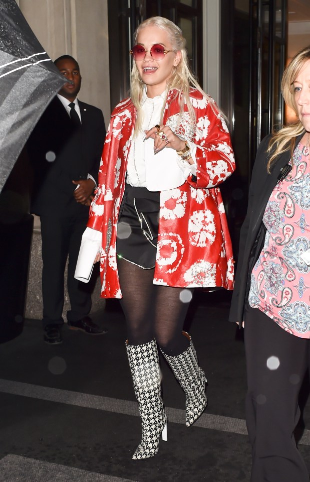 Rita Ora looked unusually covered-up in contrasting prints