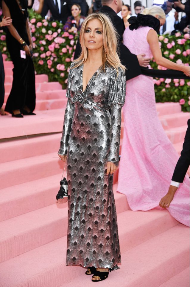  Sienna Miller wore a metallic gown