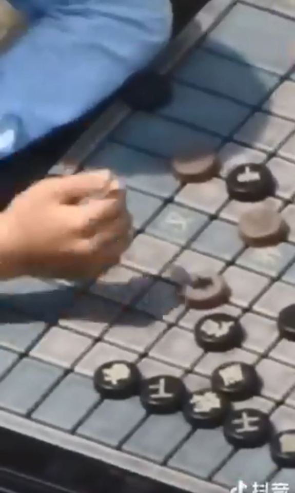  And at the height of its zoom, the camera can clearly distinguish the kids' playing pieces