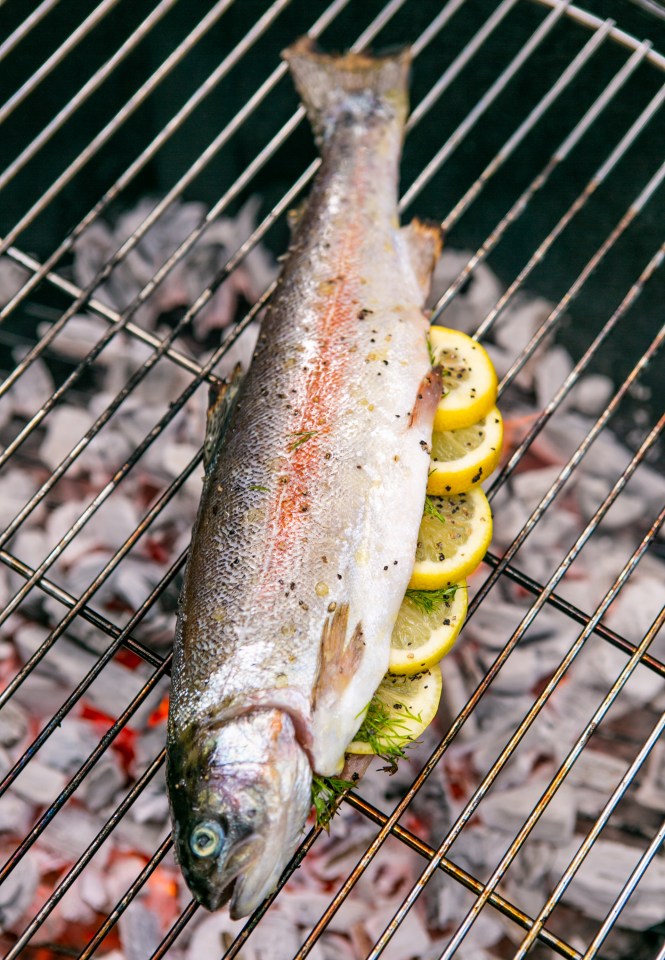  Add fresh herbs to your charcoal to give your meat and fish a boost of flavour