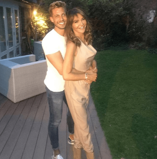 Lizzie posing with a pal in her garden
