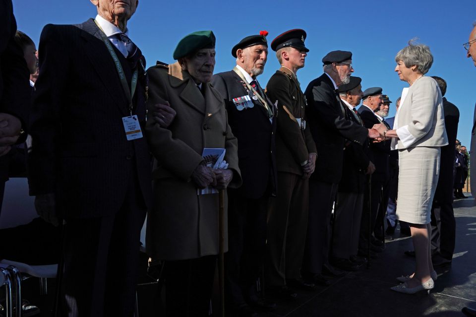  Mrs May spoke to current serving military and veterans who were there on that day
