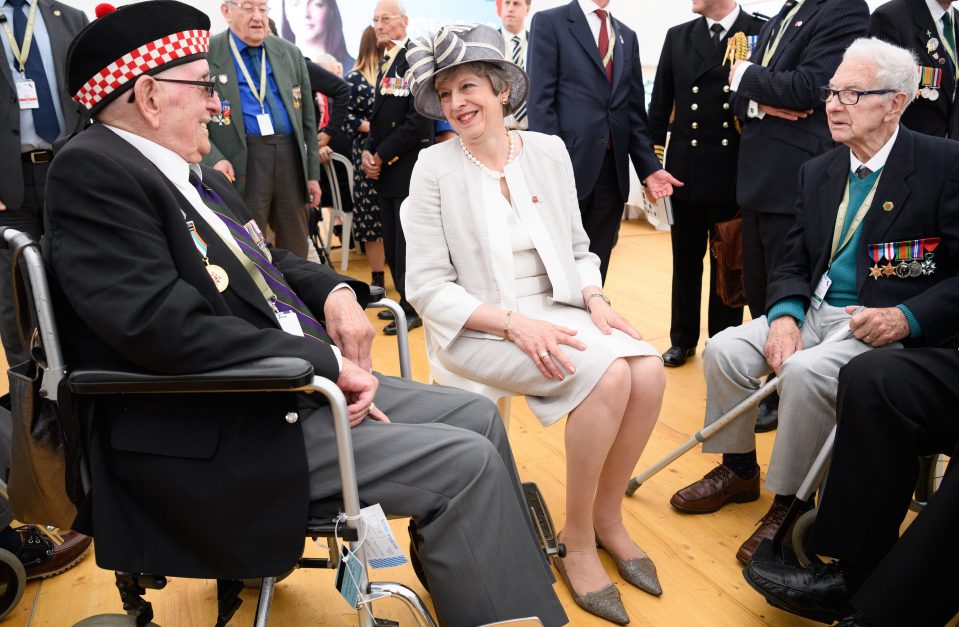  Mrs May spent her last day before stepping down as Tory leader with veterans in France