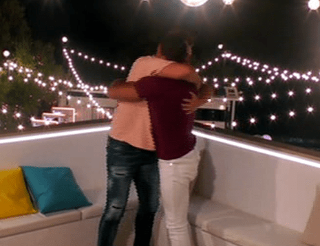  The two men hugged it out on the terrace