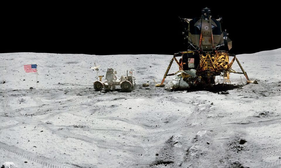  Panorama view of Apollo 16 commander Astronaut John W. Young, working at the Lunar Roving Vehicle