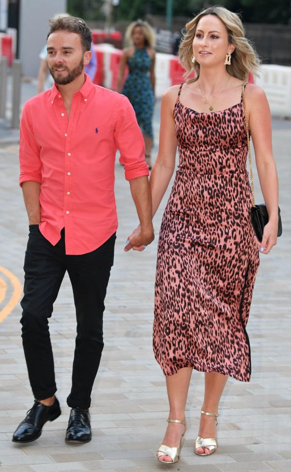  Jack showed off his impressive tan in a bright pink shirt, which matched girlfriend Hanni's dress