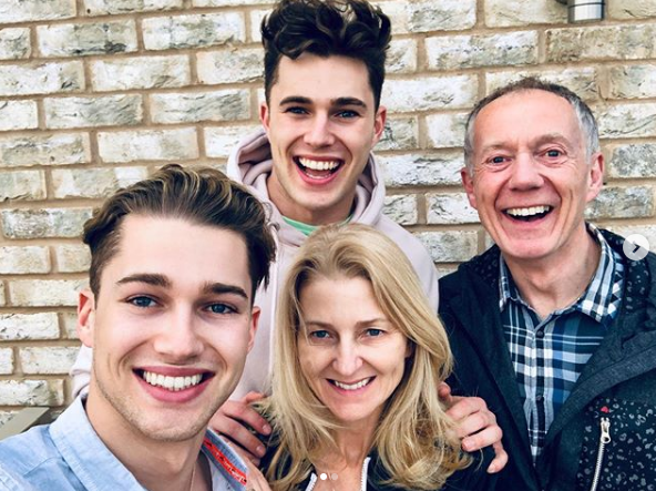  Curtis, pictured here with his mum, dad, and brother AJ, has been defended by his family