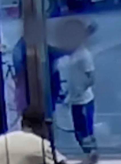  The bodyguard was seen waving his arm at the teen at the beginning of the video