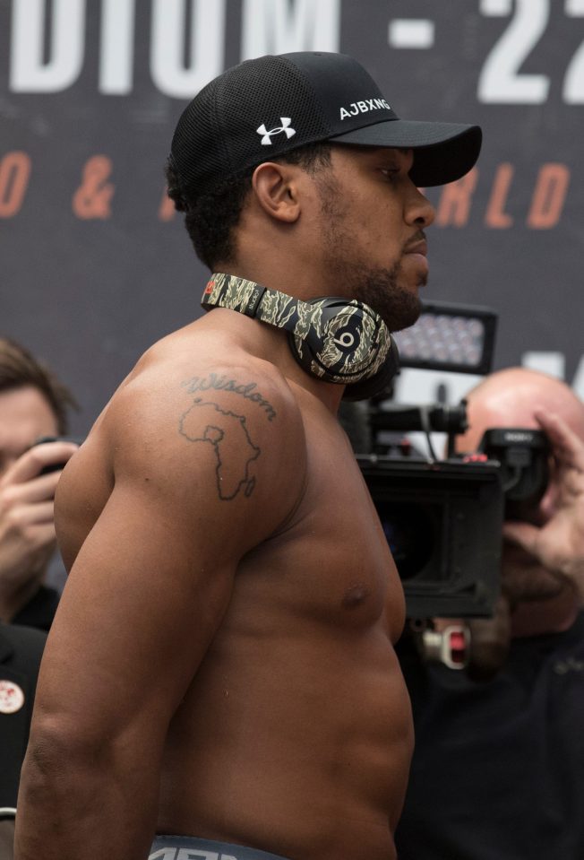The outline of the map of Africa on Joshuas right arm celebrates his heritage
