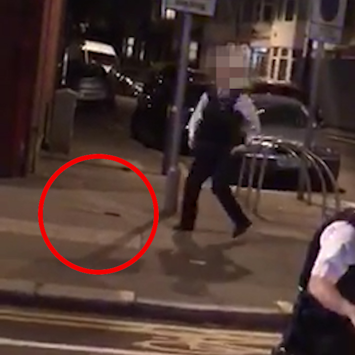 The cop managed to throw the machete away after the unprovoked attack unfolded just after midnight