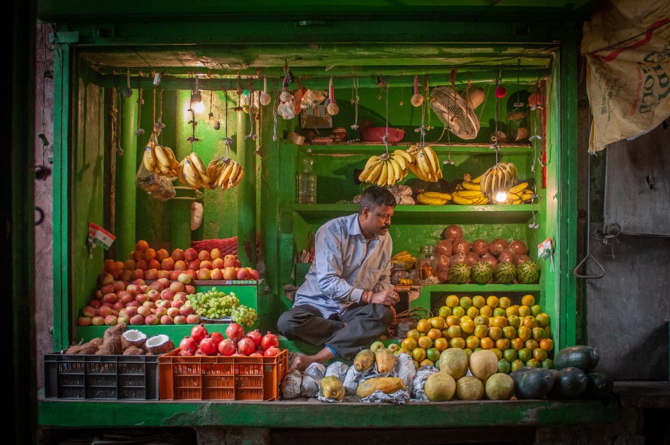  ‘Fruit & Veg’: pic of a stall holder was taken in a market in Kolkata, India, by Louise Waldron