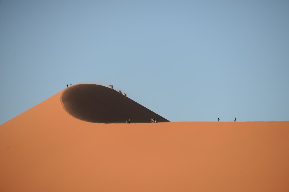  Glorious hues of blue and reddish-brown stand out in 'Journey Up The Sand Dune' by William Courage