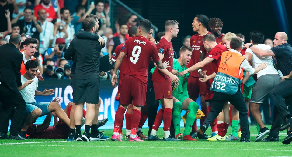  Deputy goalkeeper Adrian was wiped out by a fan rushing to join the celebrations after his Super Cup heroics on Wednesday
