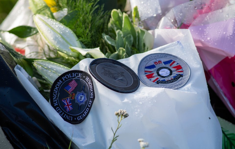  Badges of honour adorned this special floral tribute