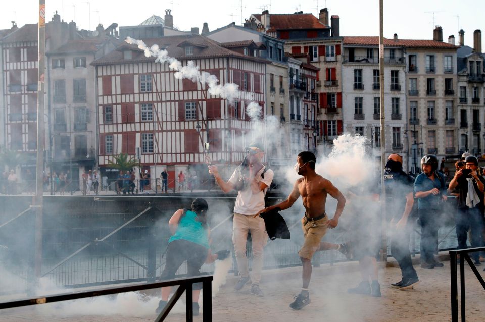 Riot cops fired a water cannon and tear gas at G7 protesters in France