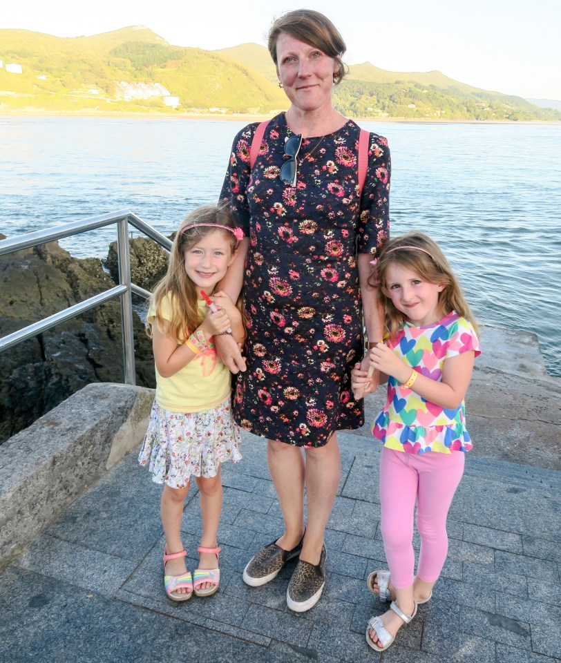 the mum of two with her twin girls Frida and Rae in 2017