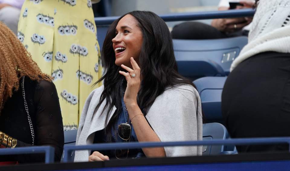  Meghan was spotted joking and laughing before the start of the match