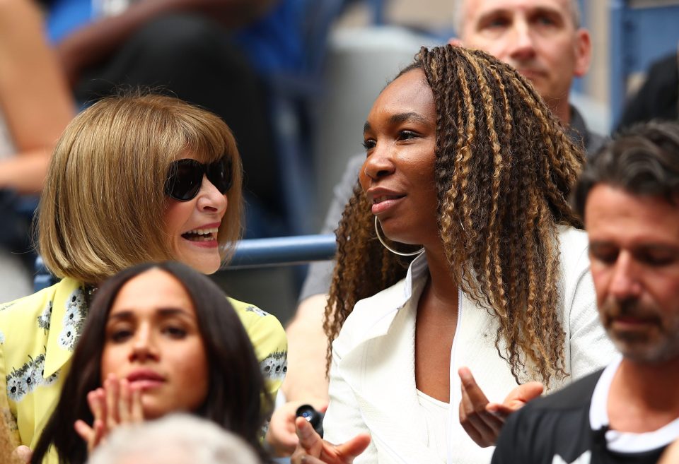  Serena's sister Venus was seen chatting to Anna Wintour one row behind Meghan