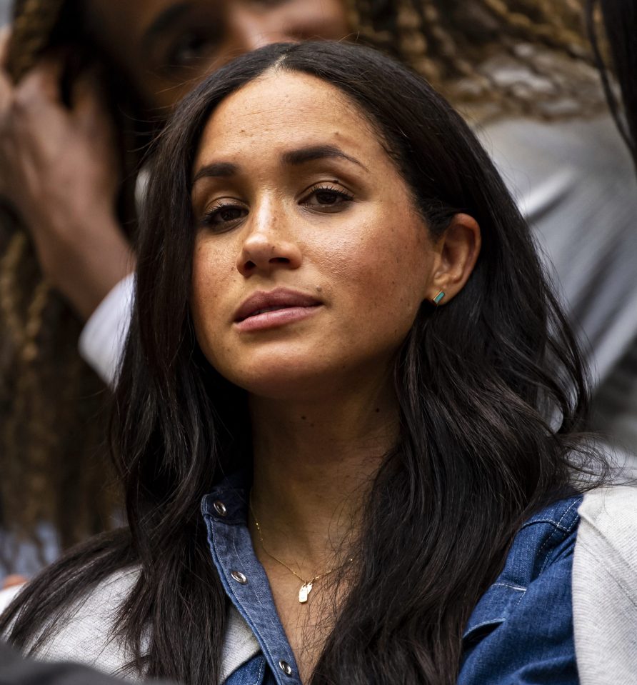  Meghan was seen raising an eyebrow during the match