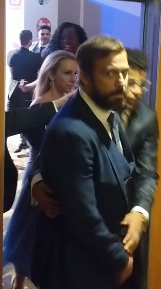  This shocking picture captured the moment Asan, top left, had to be held back after 'threatening to kill' the Hollyoaks actor