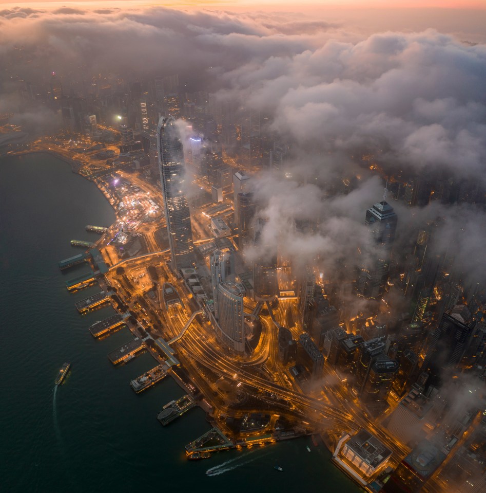 The honorable mention in the cities and nature category was by Tsz Ho Tse from Hong Kong who took this image of his city's world-famous Victoria Harbour under the clouds