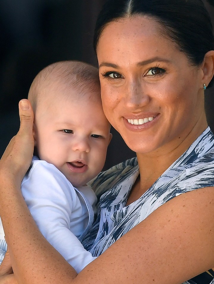  Meghan and Archie look happy to be meeting Desmund Tutu while on their trip in South Africa