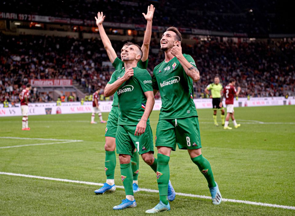  Ribery and his Fiorentina team-mates celebrate in front of the away fans at the San Siro