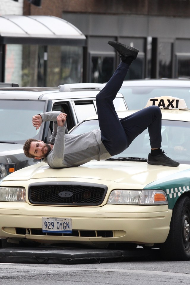  Liam Hemsworth 'gets hit by a taxi' during a movie stunt