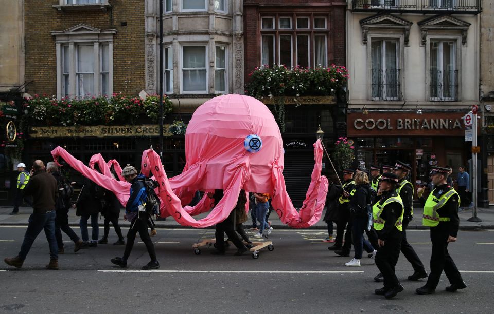 Armed and dangerous, Extinction Rebellion protesters with 'octopus'