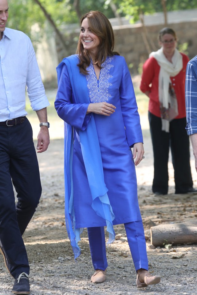  Kate follows in her mother-in-law's footsteps, looking equally chic in her loose blue kurta as she mingled at the school