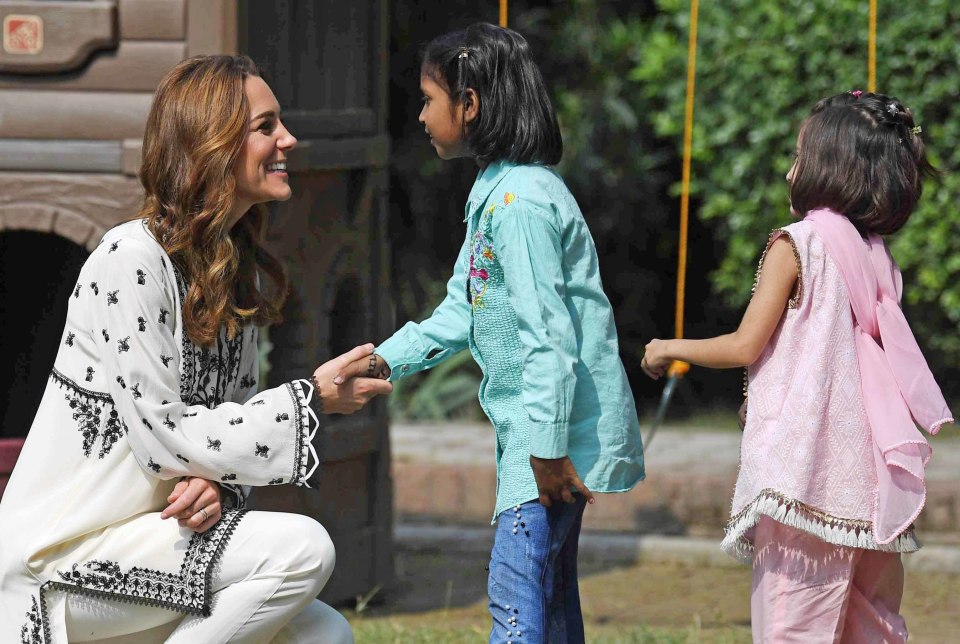 Kate stopped to talk with the local children during the tour