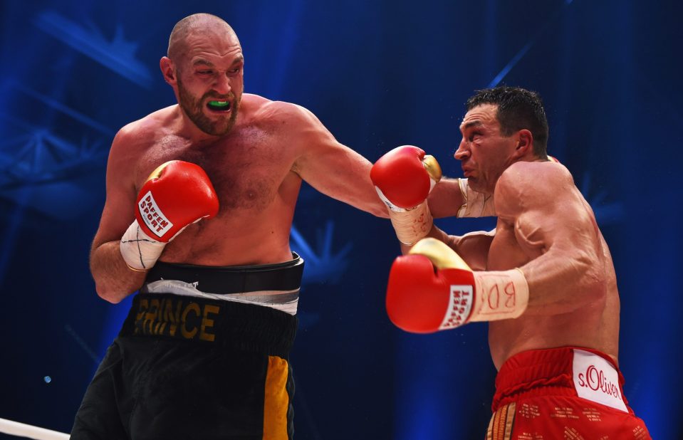  Tyson connects with Klitschko in their 2015 bout, later securing the victory