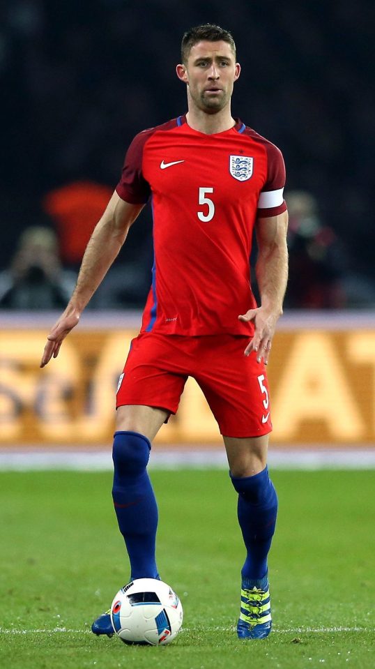 For some reason Umbro paired bright blue socks with the red away kit