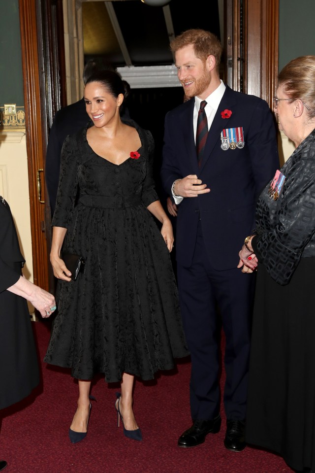  Meghan Markle and Prince Harry arrive for the Festival of Remembrance service at the Royal Albert Hall