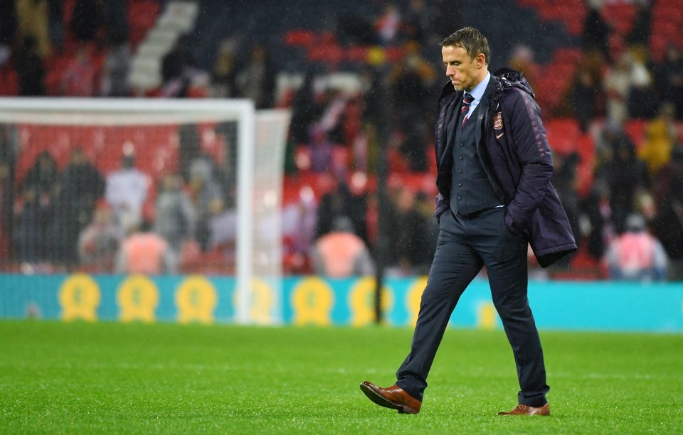  Phil Neville tasted defeat in his first Wembley match as a manager