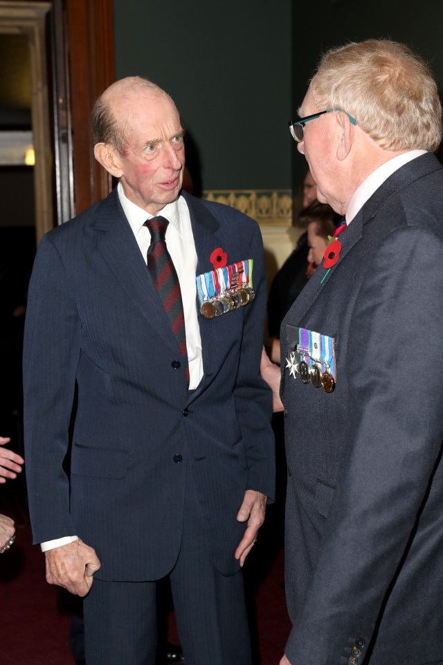  Prince Edward, Duke of Kent, wore a classic navy suit while proudly displaying his medals on his chest