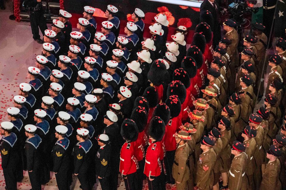  The Army and Navy standing together during the annual Royal British Legion Festival of Remembrance