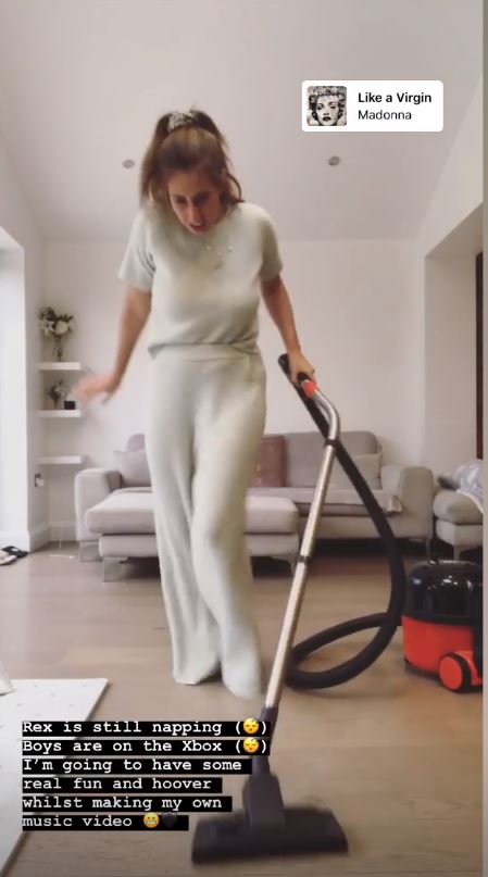  Stacey showed off her moves while hoovering