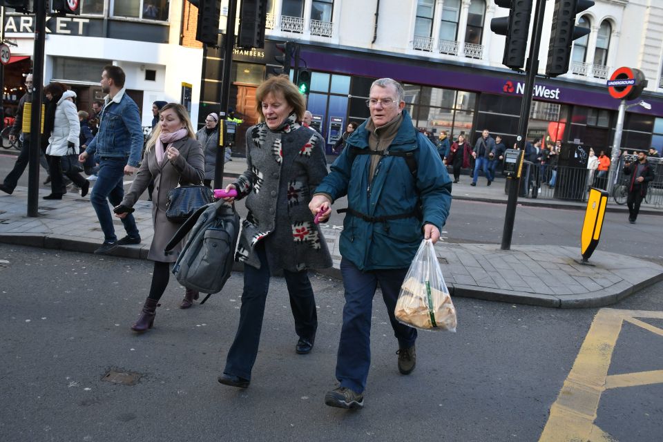 A man and woman flee