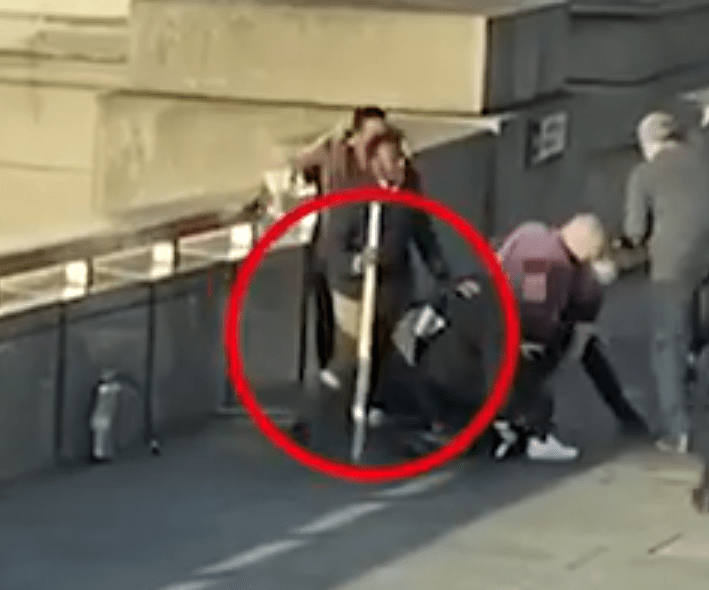  Dramatic footage shows a man wielding a narwhal tusk after grabbing it off a wall and chasing the suspect