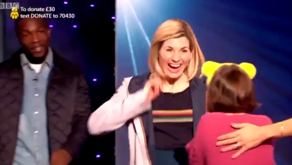 Then the doors opened to show Jodie standing there