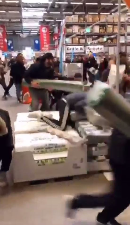  Out of my way: people were diving on to cartons
