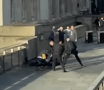 Bystanders stopped the man, who had a knife, on the bridge before