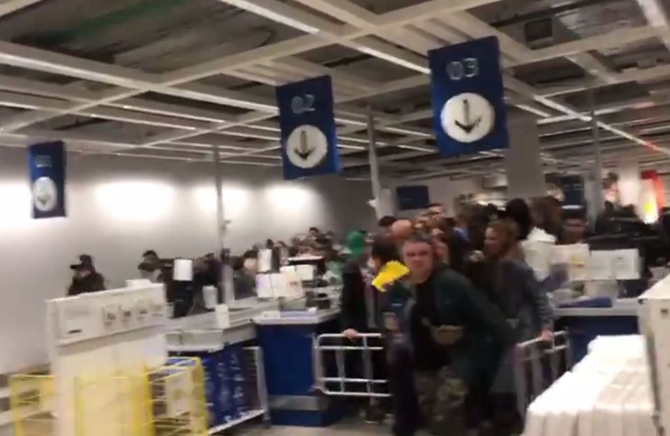  In Switzerland, shoppers were filmed barging through the barrier