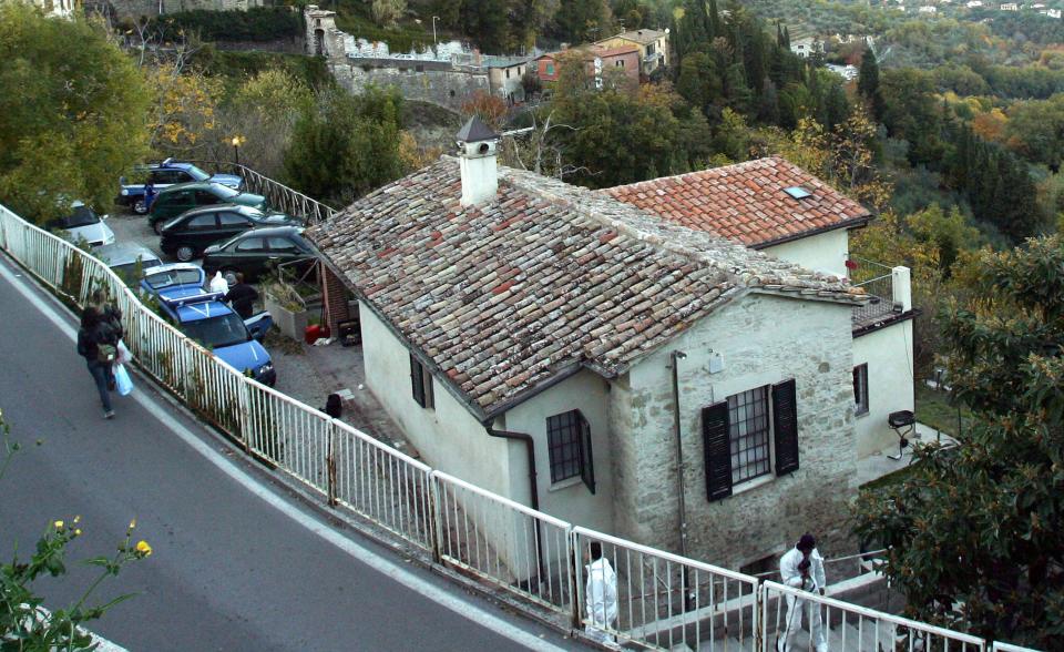  Forensic officers at teh scene of the murder in Perugia