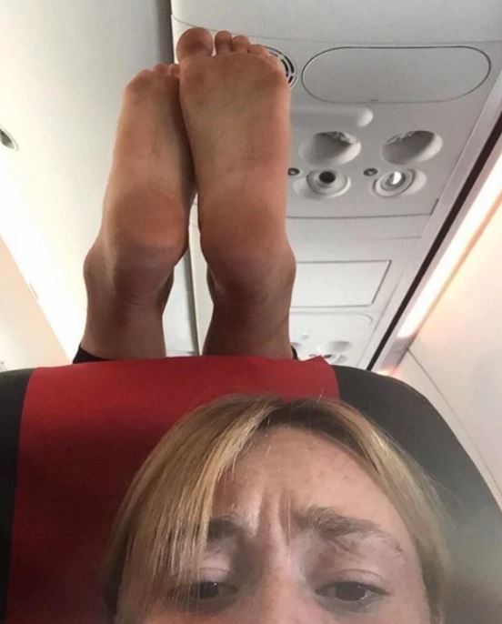 One woman became the victim of someone using her headrest to prop up their dirty feet