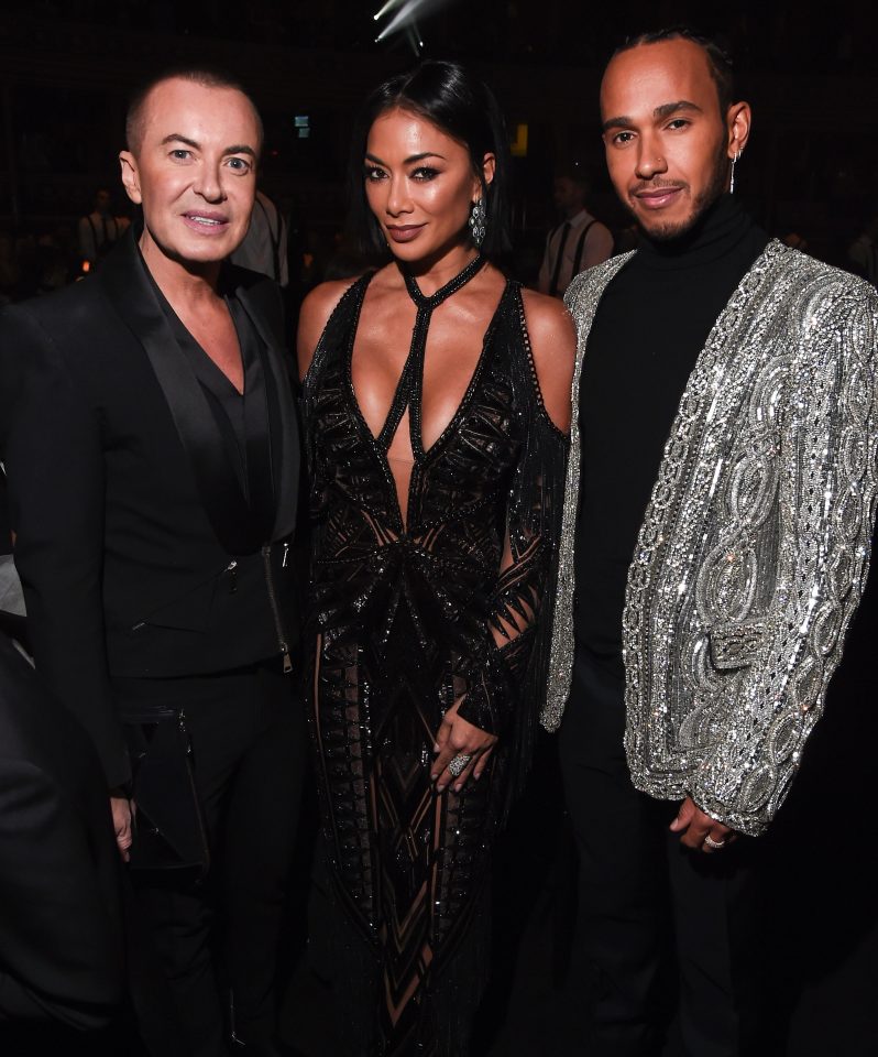 The Pussycat Doll posed with Julien MacDonald and ex Lewis Hamilton
